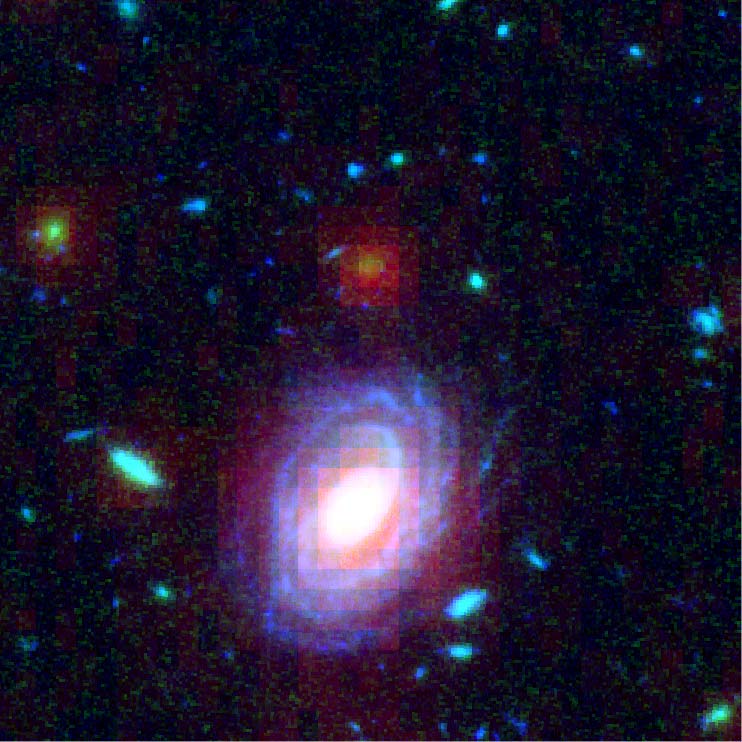 A young but heavy galaxy in the background; from STScI